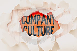 Hand writing sign Company Culture. Concept meaning The environment and elements in which employees work Breaking Writers