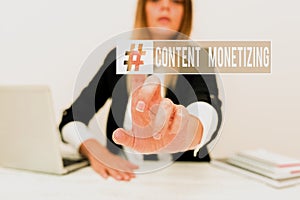Hand writing sign Content Monetizing. Business overview making money from content that exists on your website Assistant