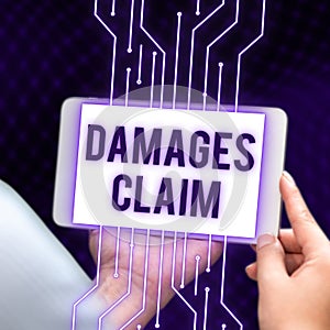 Hand writing sign Damages Claim. Concept meaning Demand Compensation Litigate Insurance File Suit