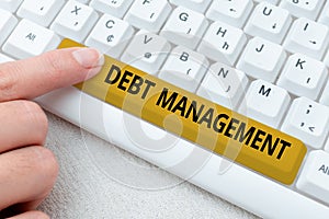 Hand writing sign Debt Management. Business idea The formal agreement between a debtor and a creditor Abstract Typing