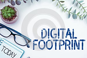 Hand writing sign Digital Footprint. Internet Concept uses digital technology to operate the manufacturing process