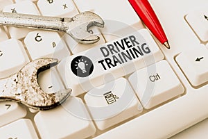 Hand writing sign Driver Training. Concept meaning prepares a new driver to obtain a driver s is license Internet