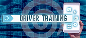 Hand writing sign Driver Trainingprepares a new driver to obtain a driver's license. Internet Concept getting a