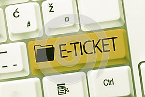 Hand writing sign E Ticket. Conceptual photo Digital ticket that is as valid as a paper ticket or its equivalent Typing