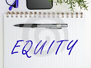Hand writing sign Equity. Business idea quality of being fair and impartial race free One hand Unity