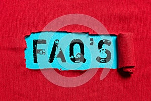 Hand writing sign Faq S Is. Business overview list of questions and answers relating to a particular subject