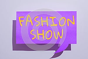 Hand writing sign Fashion Show. Internet Concept exibition that involves styles of clothing and appearance