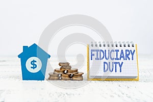 Hand writing sign Fiduciary Duty. Conceptual photo A legal obligation to act in the best interest of other Preparing