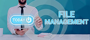 Hand writing sign File Managementcomputer program that provides user interface to manage data. Internet Concept computer