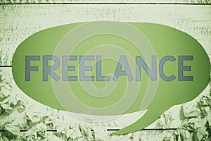Hand writing sign Freelance. Business concept working at different firms rather than being permanently Notebook With New