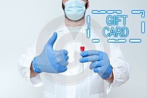 Hand writing sign Gift Card. Internet Concept A present usually made of paper that contains your message Doctor