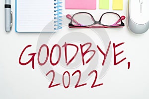 Hand writing sign Goodbye 2022. Internet Concept New Year Eve Milestone Last Month Celebration Transition Flashy School photo