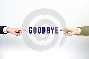 Hand writing sign Goodbye. Word Written on the words or actions that are used when someone leaves or departed