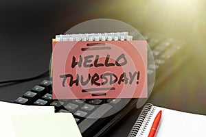 Hand writing sign Hello Thursday. Business idea a positive message as the Friday s is herald passes by Abstract Typist
