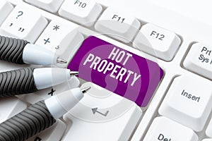 Hand writing sign Hot Property. Business overview Something which is sought after or is Heavily Demanded