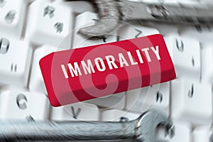 Hand writing sign Immorality. Business idea the state or quality of being immoral, wickedness