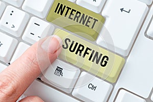 Hand writing sign Internet Surfing. Word Written on browsing the Internet Navigating the world wide web