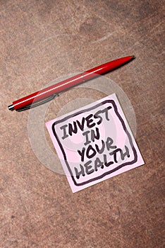 Hand writing sign Invest In Your Health. Business overview Live a Healthy Lifestyle Quality Food for Wellness