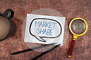 Hand writing sign Market Share. Internet Concept The portion of a market controlled by a particular company