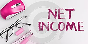 Hand writing sign Net Income. Business overview the gross income remaining after all deductions and exemptions are taken