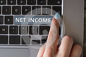 Hand writing sign Net Income. Business showcase the gross income remaining after all deductions and exemptions are taken
