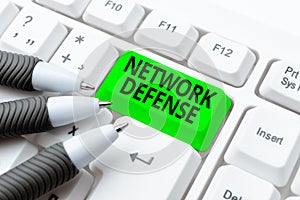 Hand writing sign Network Defense. Business overview easures to protect and defend information from disruption Typing