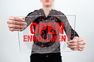 Hand writing sign Open Enrollment. Business concept policy of allowing qualifying students to enroll in school