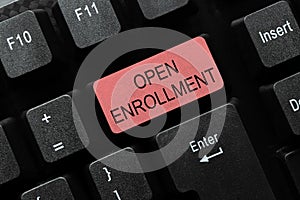 Hand writing sign Open Enrollment. Business overview policy of allowing qualifying students to enroll in school Abstract