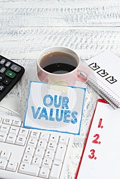Hand writing sign Our Values. Business overview things that you believe are important the way you live and work Typing
