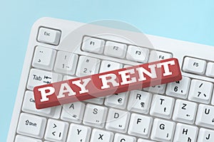 Hand writing sign Pay Rent. Internet Concept To pay money in exchange for the use of someone else s is property Editing