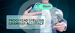 Hand writing sign Proofread Spelling Grammar Accuracy. Word for reading and marking spelling, grammar mistakes