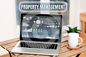 Hand writing sign Property Management. Business concept the control, maintenance, and oversight of real estate Laptop