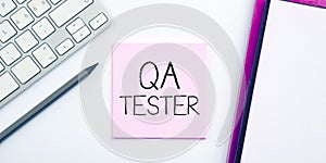 Hand writing sign Qa Tester. Conceptual photo Quality assurance of an on going project before implementation