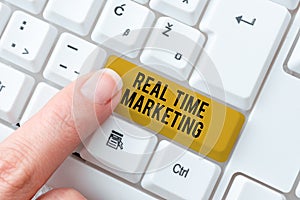 Hand writing sign Real Time Marketing. Internet Concept Creating a strategy focused on current relevant trends Abstract