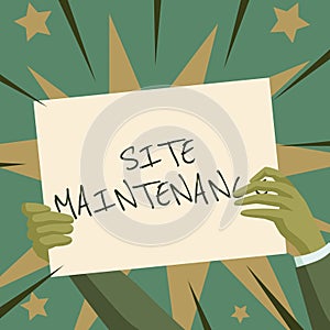 Hand writing sign Site Maintenance. Business idea keeping the website secure updated running and bugfree Hands Holding