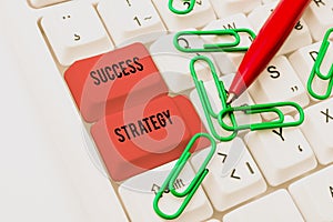 Hand writing sign Success Strategy. Business showcase provides guidance the bosses needs to run the company Editing And