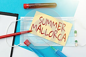 Hand writing sign Summer Mallorca. Word for Spending the holiday season in the Balearic islands of Spain Presenting