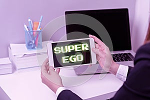 Hand writing sign Super Ego. Business overview The I or self of any person that is empowering his whole soul -47522