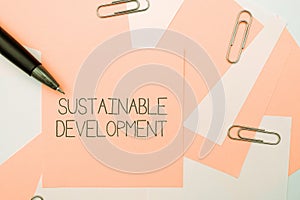 Hand writing sign Sustainable Development. Business overview the ability to be sustained, supported, upheld, or