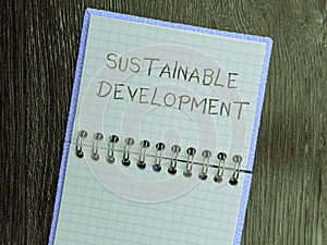 Hand writing sign Sustainable Development. Internet Concept the ability to be sustained, supported, upheld, or confirmed