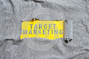 Text caption presenting Target Marketing. Business showcase production and distribution of yarn cloth and clothing photo