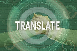 Hand writing sign Translate. Business overview Another word with same equivalent meaning of a target language Handshake photo