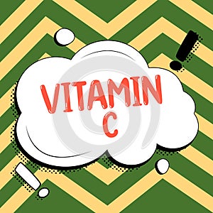 Hand writing sign Vitamin C. Conceptual photo it promotes healing and helps the body absorb iron Ascorbic acid