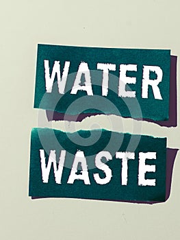 Hand writing sign Water Waste. Concept meaning liquid that has been used as part of an industrial process