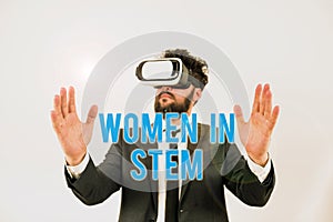 Hand writing sign Women In Stem. Conceptual photo Science Technology Engineering Mathematics Scientist Research