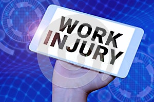 Hand writing sign Work Injury. Business showcase an accident occurred as a result of labor resulting to an damage photo