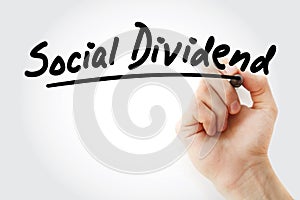 Hand writing Social dividend with marker