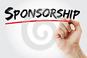 Hand writing Sponsorship with marker, business concept background