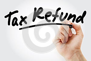Hand writing Tax Refund with marker