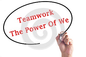 Hand writing Teamwork The Power Of We on transparent board